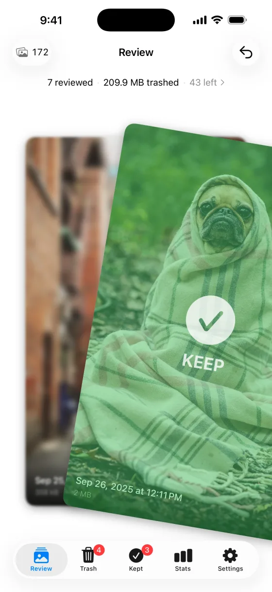 Swipe right to keep. A photo of a dog joins the kept collection.